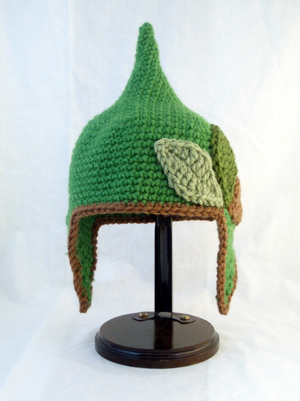 Pointed Green Baby Hat with Earflaps and Varying Green and Brown Leaves