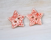 ceramic Star Buttons a pair of handmade ceramic buttons in Bold Red