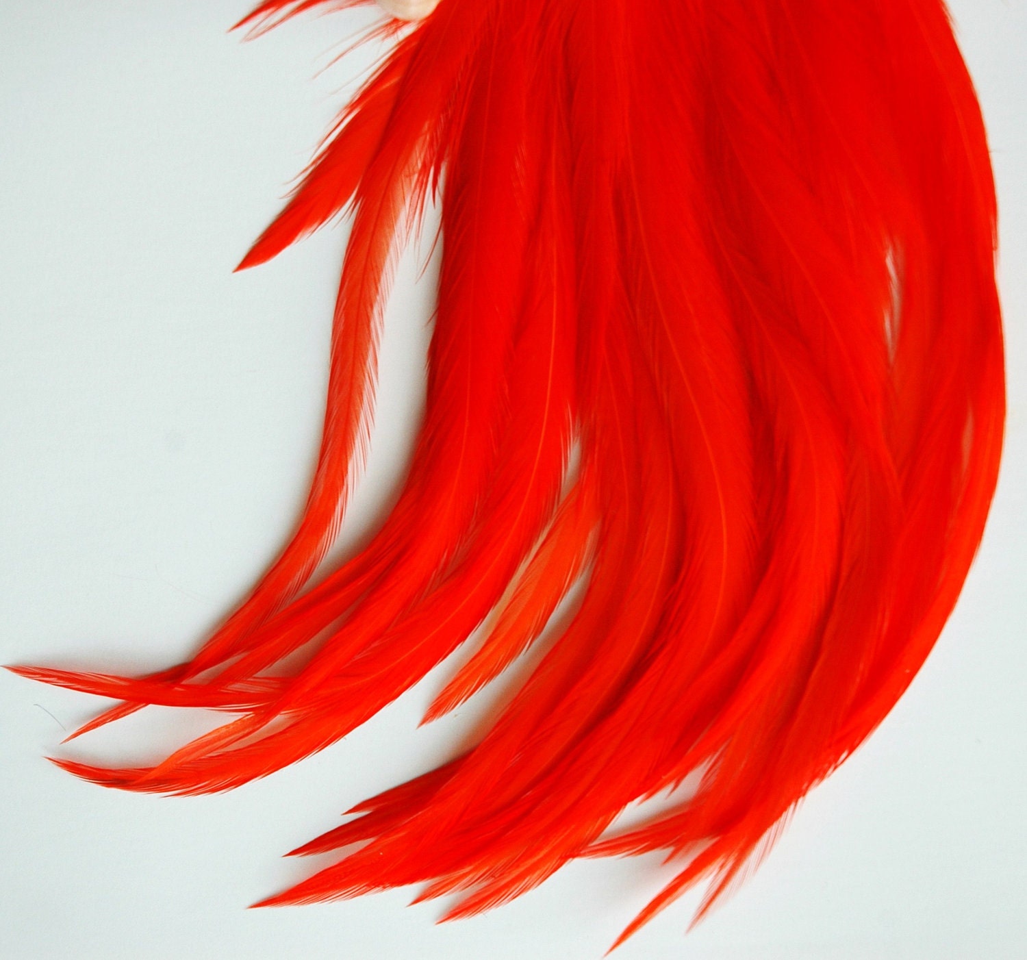 20-30 short orange feathers (3-5 inches) - BRIGHT ORANGE bulk lot