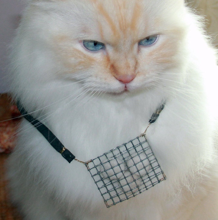 TRAPPED cat hair pendant created for Must Love Cats