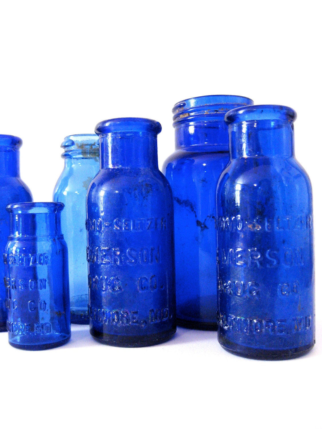 8 antique cobalt blue bottles