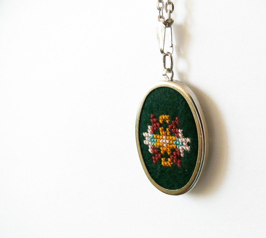 Hand embroidered necklace cross stitch on dark green felt