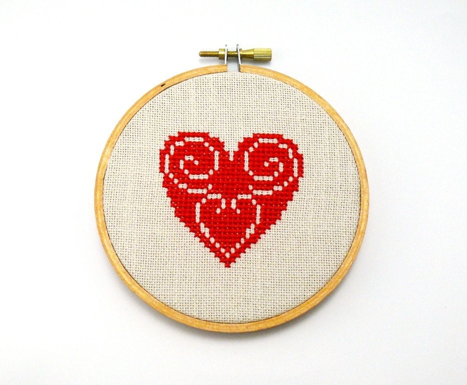 Red heart cross stitch in wooden hoop