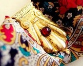 Gypsy - Antique 1910s-1920s Grecian Brass Dress Clip with Garnet Glass Cabochon Stone