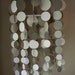 Paper chandelier or mobile.  Beautiful for weddings, nurserys, or party decorations (made to order).