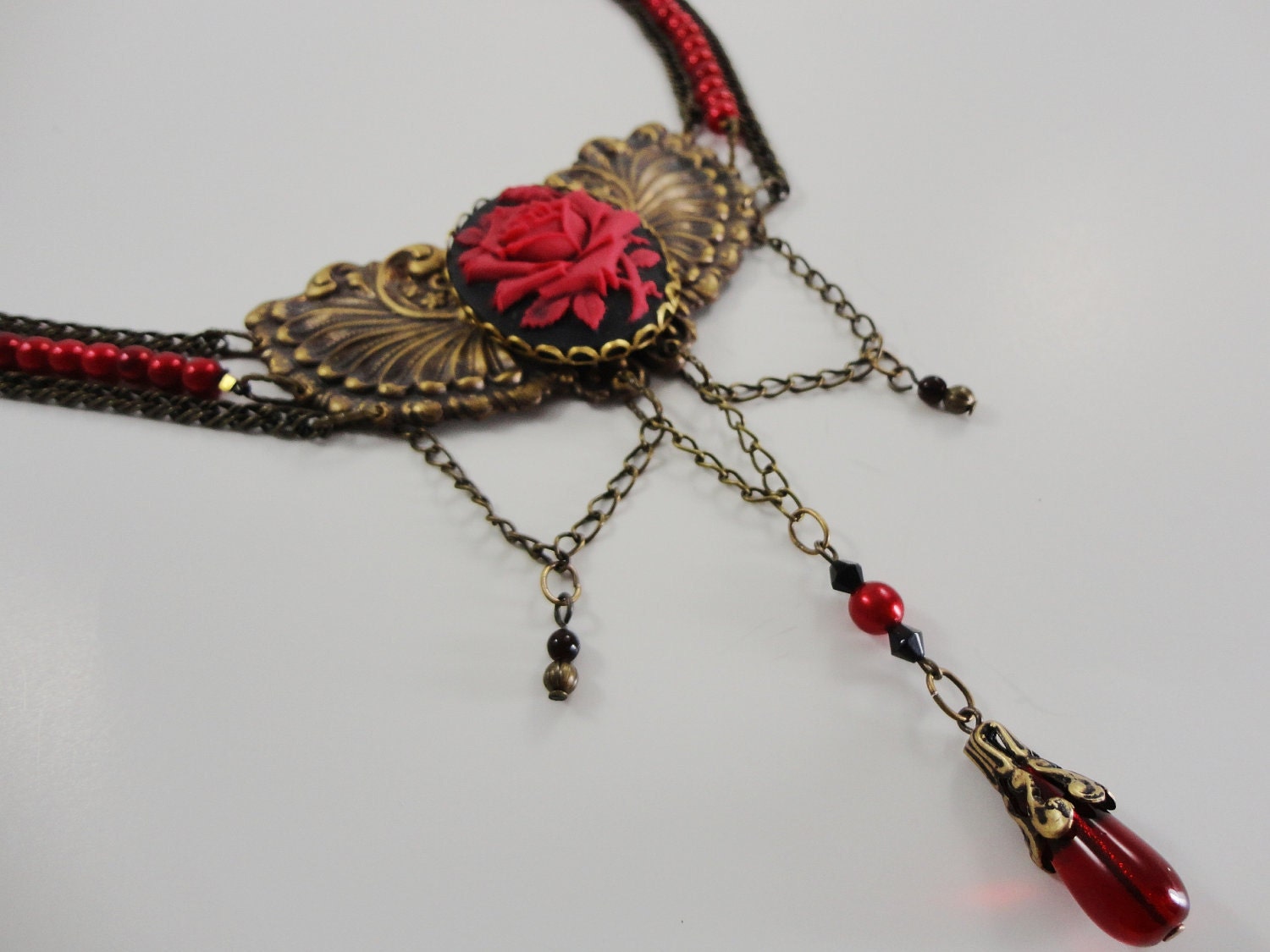Goddess Wings Choker Necklace - Rose Red and Black Cameo on Ox Brass Wings with Faux Pearls and Chain by Dr Brassy Steampunk
