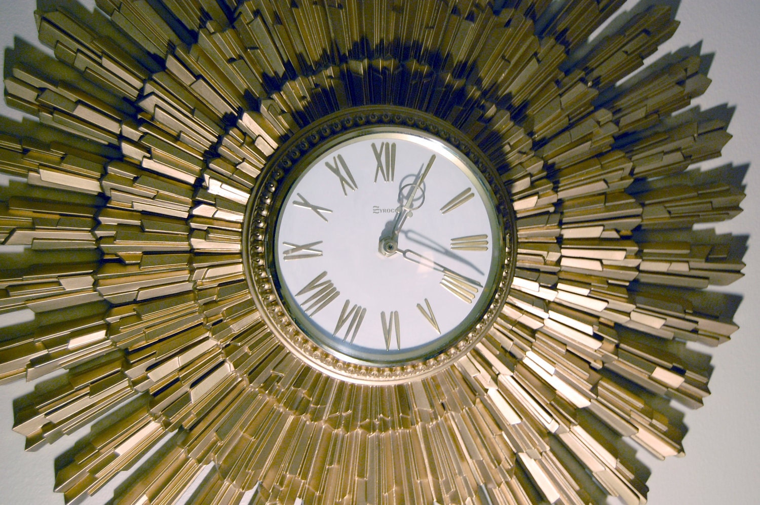 Hollywood Regency Syroco Starburst Clock from 1969
