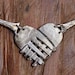 Tangled heart fork necklace