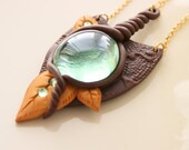 Lunar blossom arrows Necklace - Polymer clay chocolate necklace with green glass drop