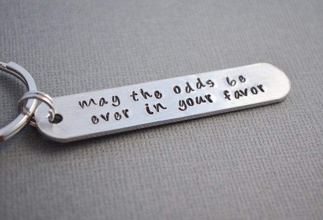 Hunger Games May the odds be EVER in your favor keychain hand stamped by TheCopperFox