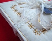 Natural calico gold clover embroidered coasters - set of 6