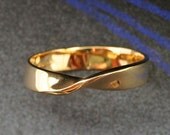 MOBIUS BAND - Continuous, Eternal. This ring in 14k yellow or white gold