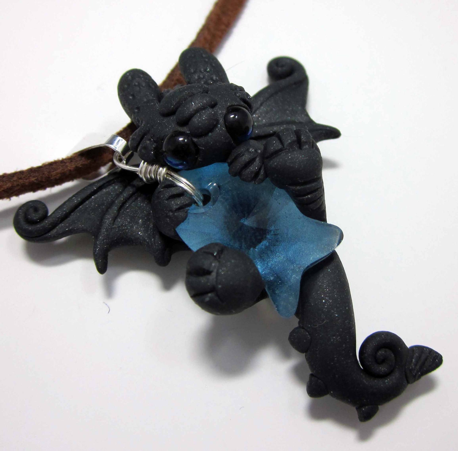 light blue fish night fury necklace