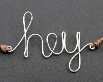 Hey Bracelet : Silver Handwritten Cursive Wire 'HEY' Bracelet with Chocolate Brown Cotton Cord, Adjustable, Crimp Beads, Greeting