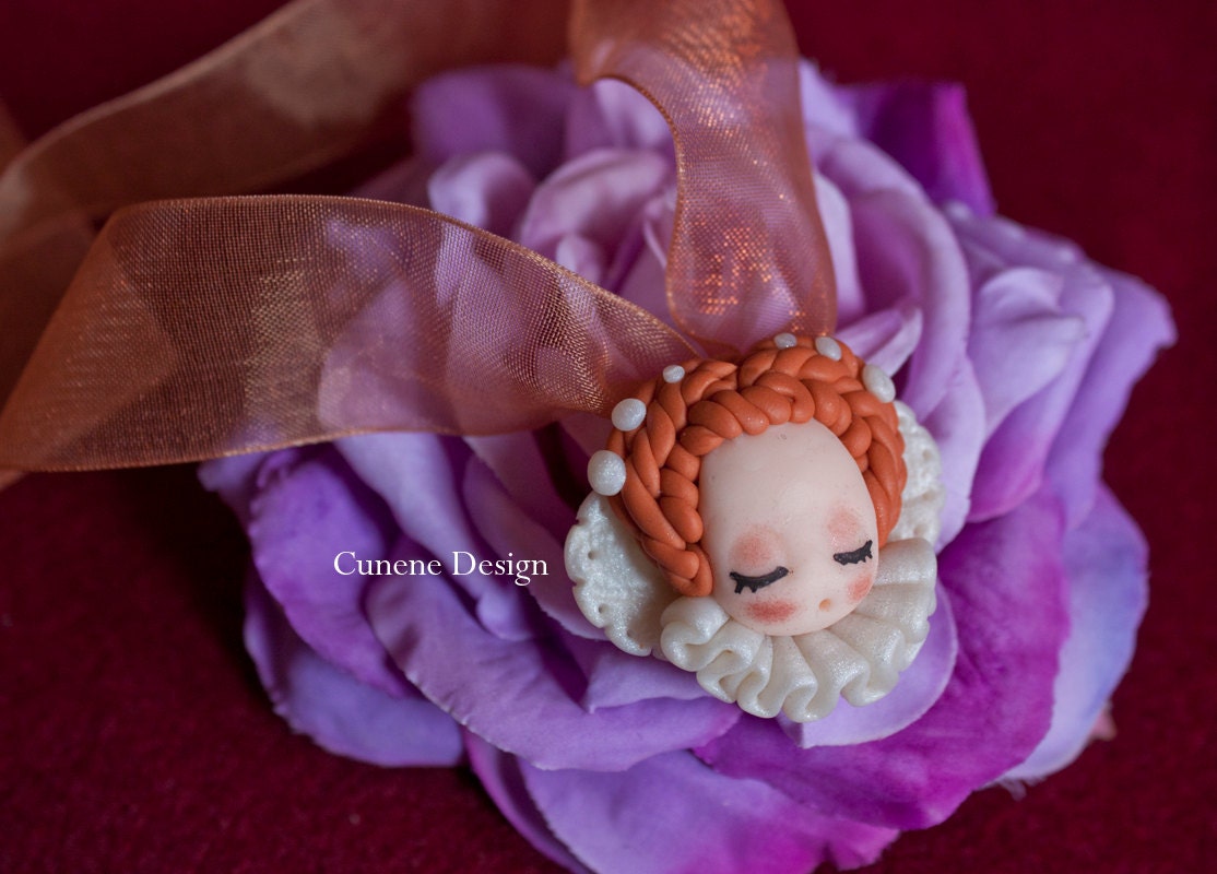 Cunene Queen Elizabeth sleeping doll Pendant