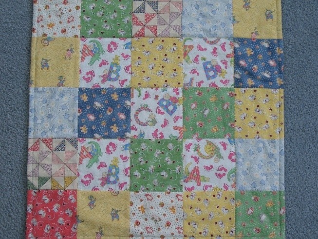 Stroller quilt with vintage look
