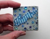 Recycled appliqued art - Leaping Hare