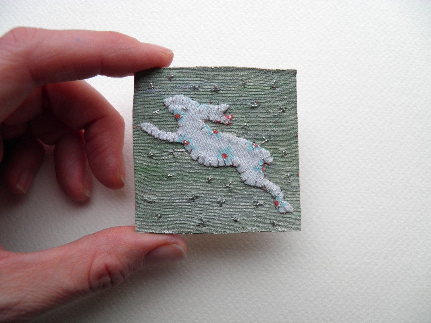 Recycled appliqued art - Leaping Hare