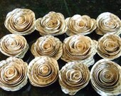1- 1.5" spiral paper flower roses made from vintage book pages