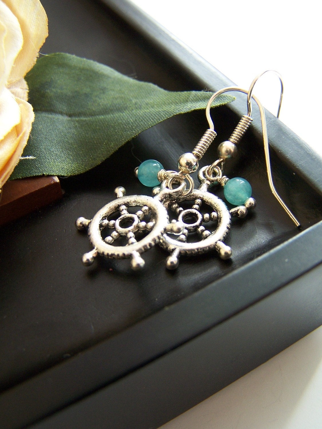 the at the helm earrings.