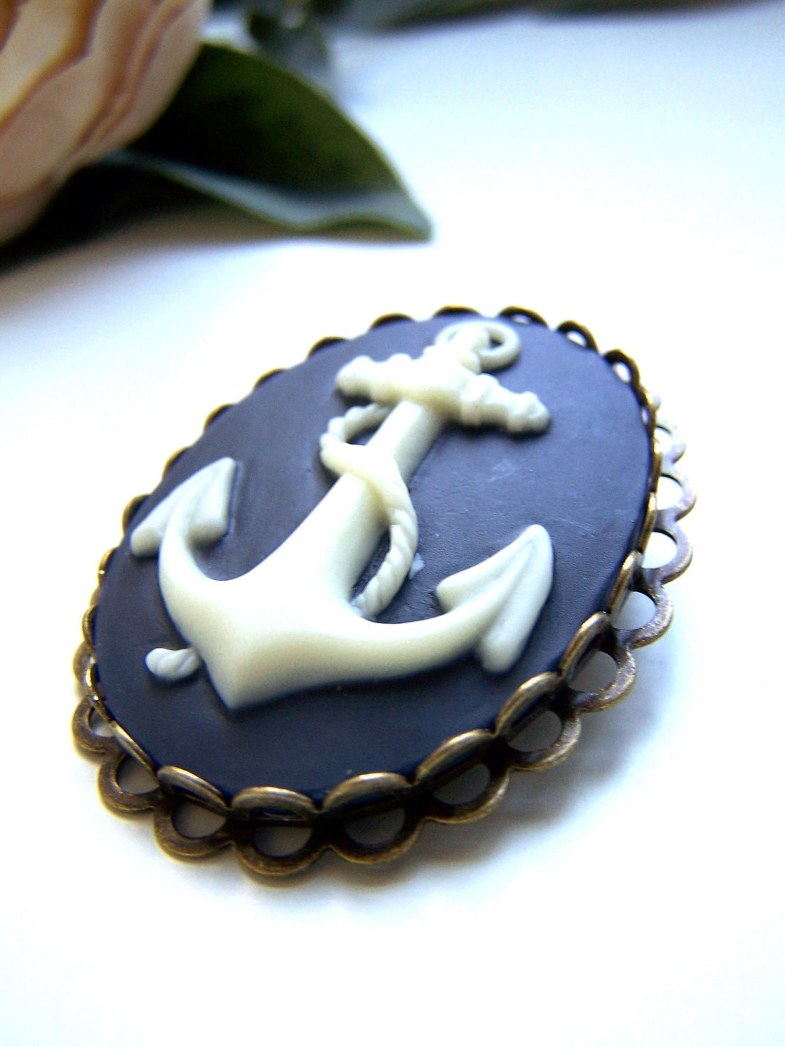 the blue anchor cameo brooch.