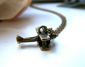 the airplane necklace in bronze.
