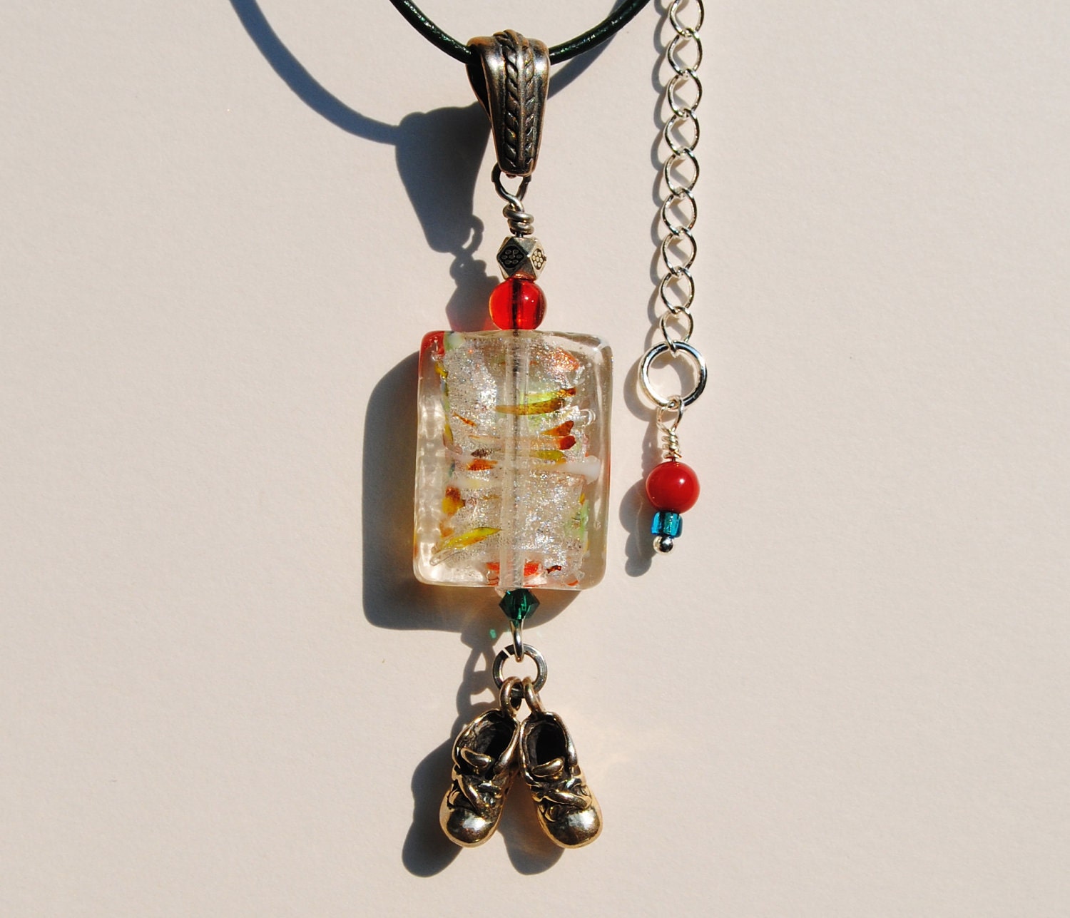 Rectangular Rainbow Speckled Glass Bead Necklace with Sterling Silver Baby Shoes Charms
