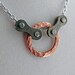 Hammered copper circle and bicycle chain bike jewelry