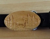 Oval Belt Buckle With Deer Walking Through Forest