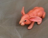 Simply orange rabbit. Polymer clay miniature by Madre Olius.