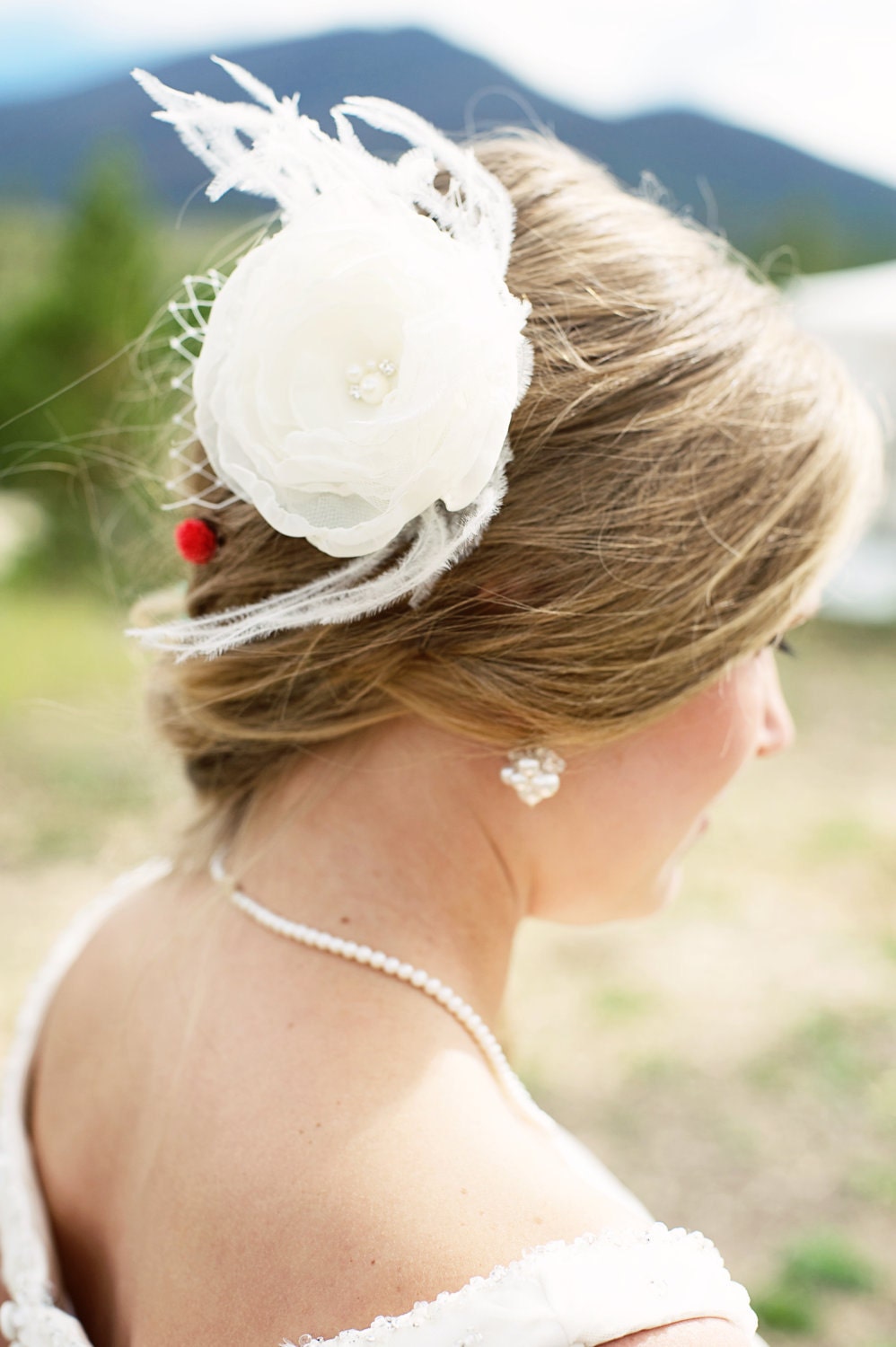 Handsewn ivory wedding hair clip/fascinator with french netting and ostich feathers
