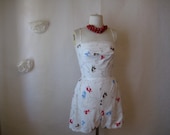 1940s 40s romper playsuit. 50s vintage swimsuit. french poodle novelty print shorts jumper.