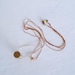 Drie - vintage brass geometric tube and brass bead double necklace