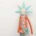 Plush - funky handmade doll With coll Haircut in Natural earth tones,Blue, turquoise, orange and red flowers