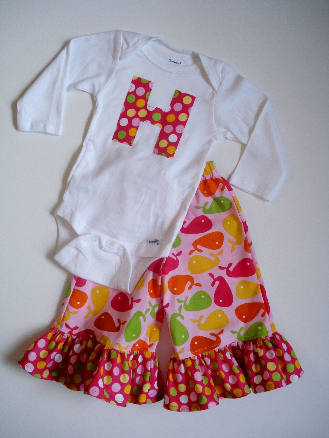 Girls Tee/Onesie & Ruffle Pants in Urban Zoology Whales, you pick the letter by Baby Harrill