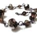 Amethyst Czech Glass Beaded Bracelet in Hematite Colored Wire