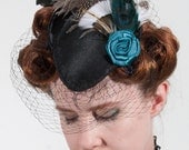 Sally black satin teardrop hat with blue rose