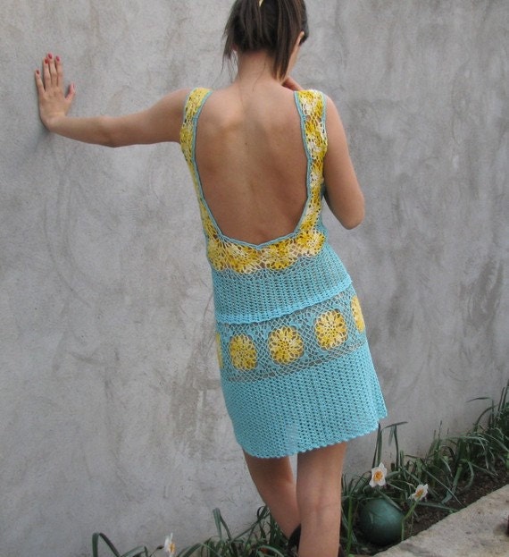 A soft blue and yellow hand crochet dress
