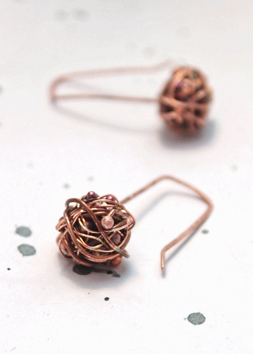Earrings of copper wire.