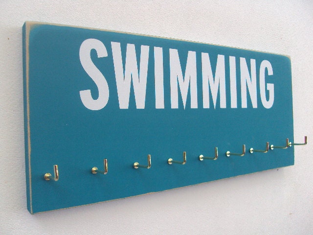 Swimming: Use a Medals Rack to display your swimming ribbons