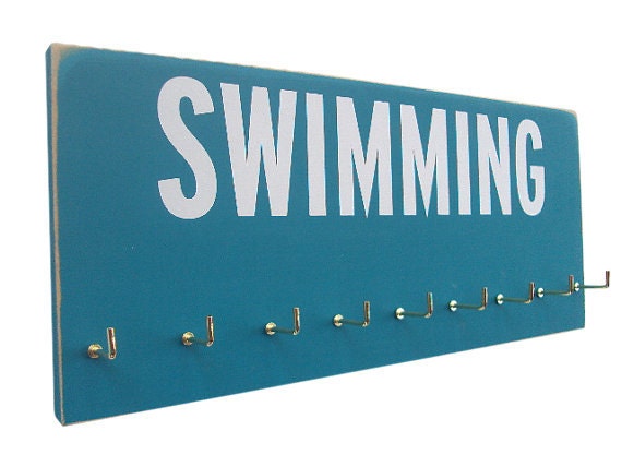 Swimming: Use a Medals Rack to display your swimming ribbons