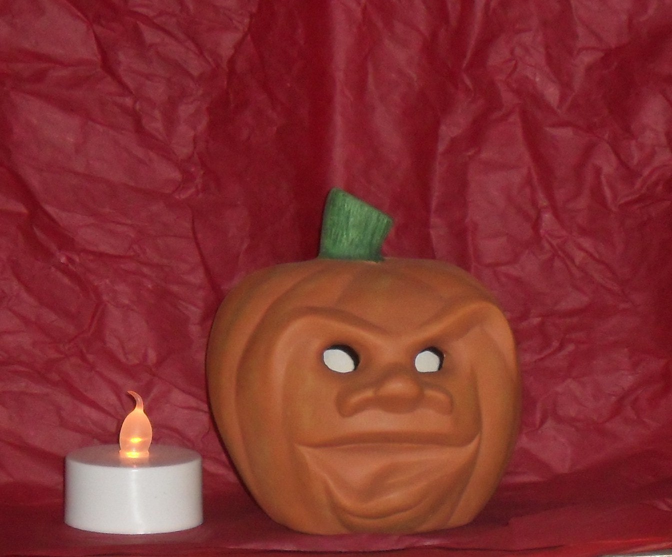 Miniature ceramic Jack-O-Lantern. Holiday fun theme