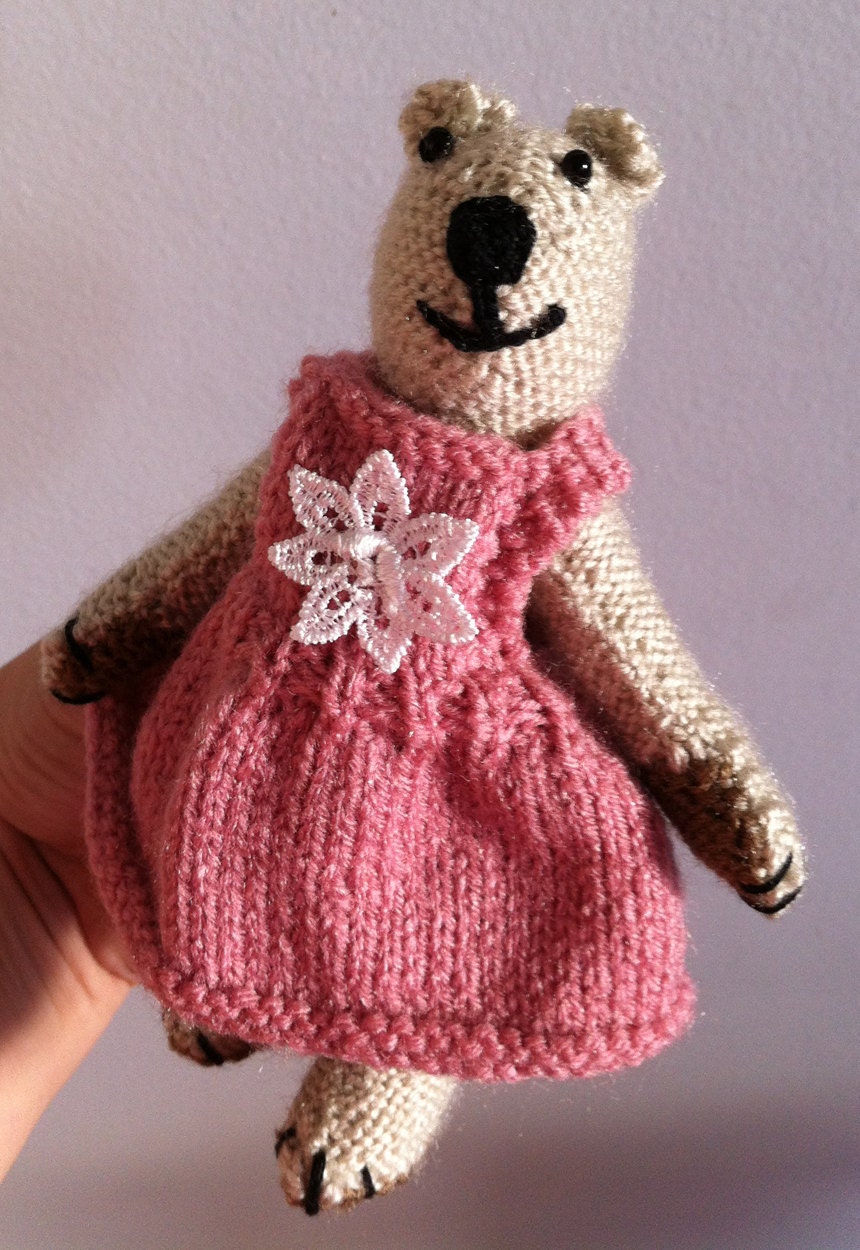 Pretty in Pink Bear: knitted pink dress with a big flower on her dress.
