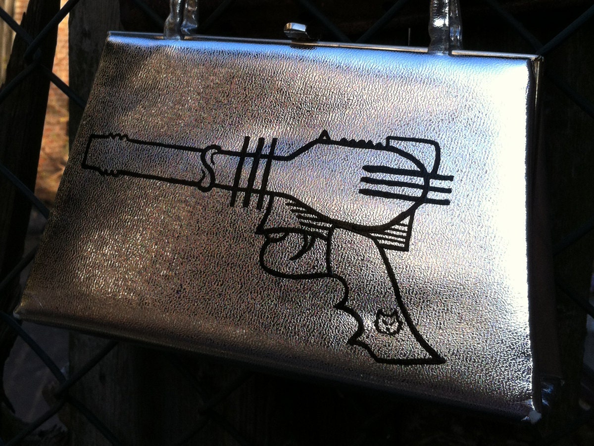 A little bit Barbarella Ray Gun. Silver upcycled hand painted vinyl purse.