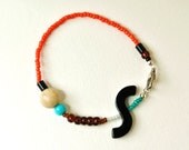 Mixed media bracelet, stacking bracelet, vintage bead bracelet, repurposed bead bracelet, jasper, orange, by nicobel