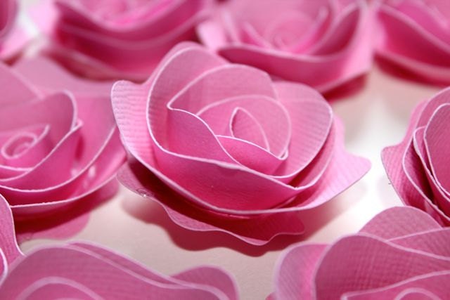 BRIGHT PINK rosette style paper flowers for weddings or embellishments - set of 100