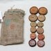 pocket change - wood slice play money
