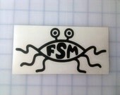 FSM Black vinyl decal (Flying Spaghetti Monster - jesus fish parody) 3"x6"