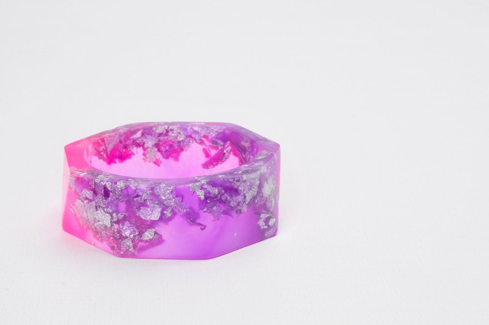 Pink and Purple resin bangle made with eco resin containing silver flakes with large triangle facets