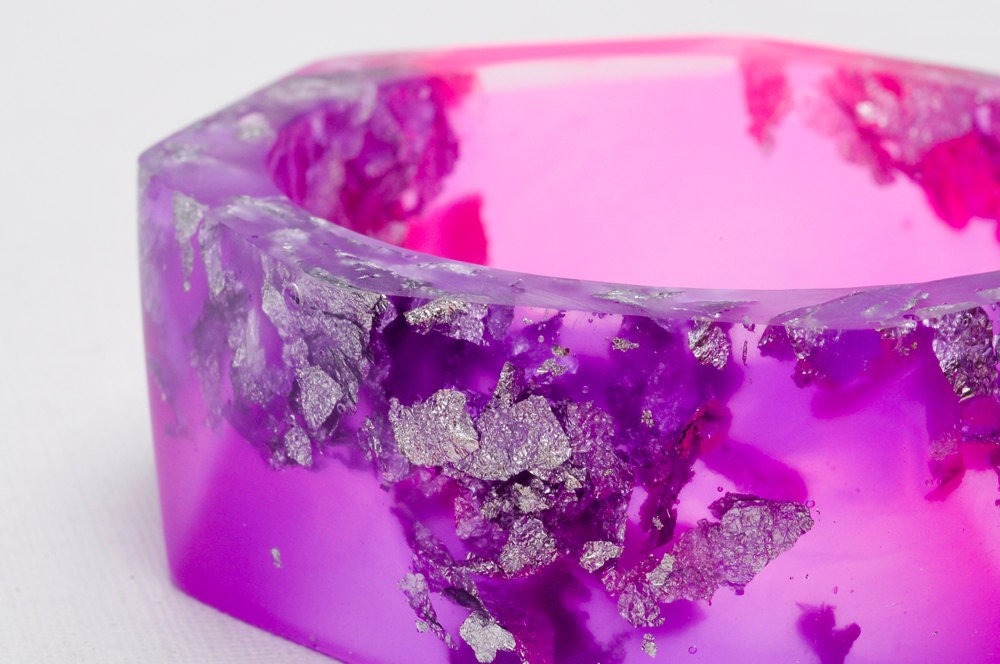 Pink and Purple resin bangle made with eco resin containing silver flakes with large triangle facets
